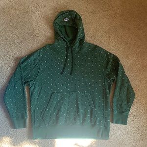 Green Nike swoosh pattern fleece hoodie with embroidered logo on the hood